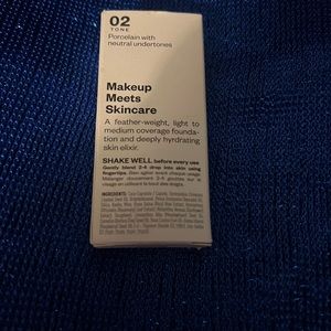 Kosas tinted face oil/foundation. Porcelain 02 shade.